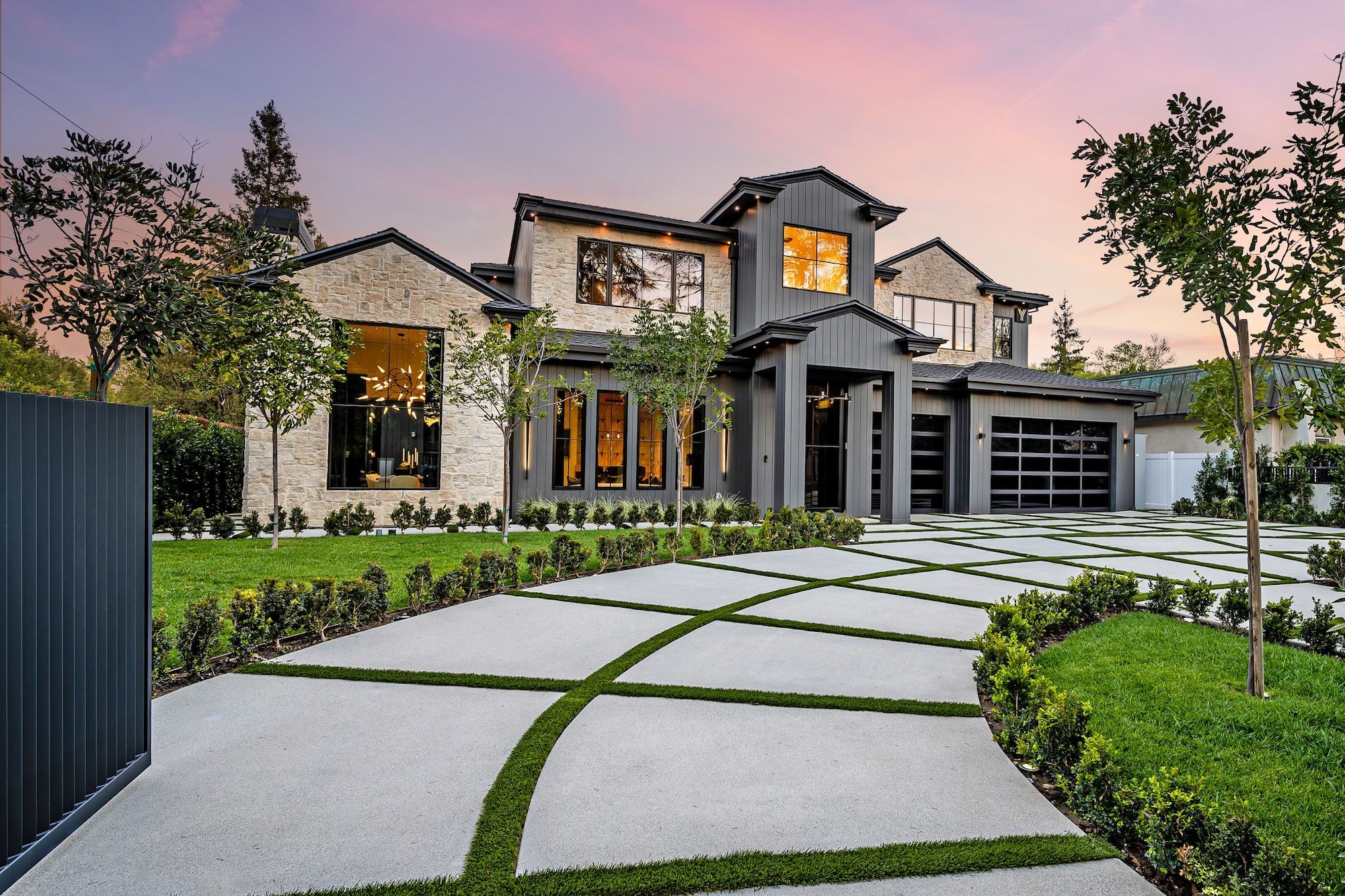 Elegant suburban home exterior at sunset in Central Texas